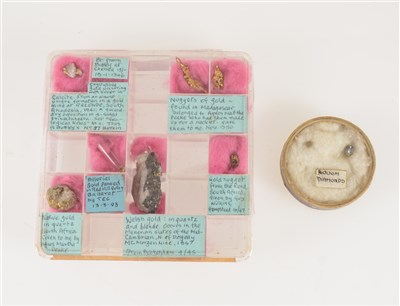 Lot 218 - Two rough diamonds, three small gold nuggets and some gold in quartz