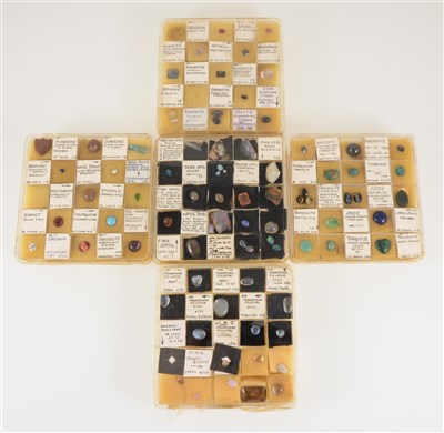 Lot 220 - Five small collectors boxes of cut and uncut gemstones, to include moonstones, opals, jade, turquoise, haematite, iolite and spinels.