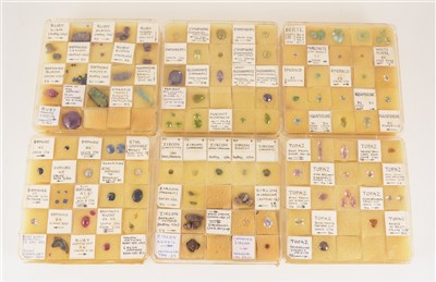 Lot 261 - Six small collectors boxes of cut and uncut gemstones, to include, sapphires, rubies, synthetic alexandrite, beryls, emeralds, aquamarines etc