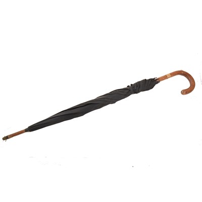 Lot 133 - A vintage black umbrella with 9 carat yellow gold collar hallmarked London 1951,  retractable pencil set into the handle.