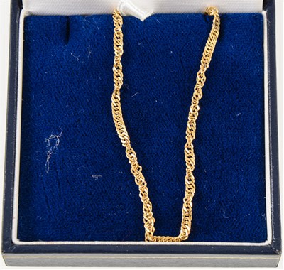 Lot 267 - An 18 carat yellow gold chain necklace, twisted flat curb link 44cm long, approximate weight 4.9gms.