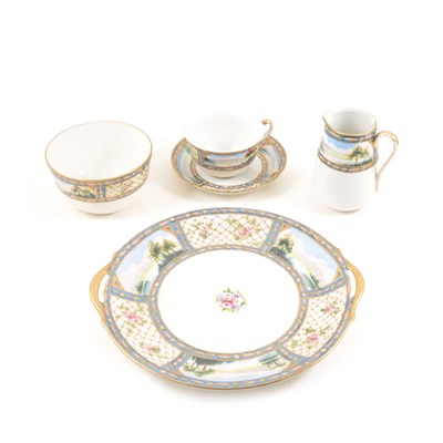 Lot 87 - A Japanese Nippon hand painted tea service decorated with a floral lattice work border and lake scenes