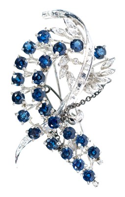 Lot 173 - A sapphire and diamond spray brooch