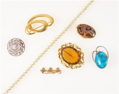 Lot 285 - A collection of gold, silver and costume jewellery, a 40mm bar brooch set with seed pearls and marked 18K