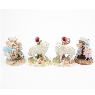 Lot 39 - Pair of Staffordshire spill vases, modelled with sheep
