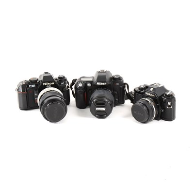 Lot 90 - Nikon and Pentax SLR cameras and lenses, some cased.