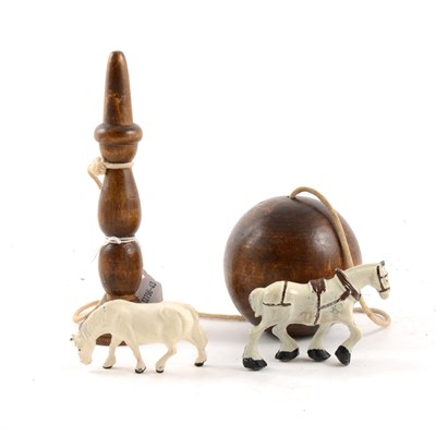 Lot 71 - 19th Century treen, ball and peg game, painted metal horses and other farm animals.