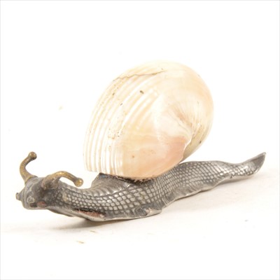 Lot 88 - An Art Nouveau silvered metal desk ornament/ letter weight, by WMF.