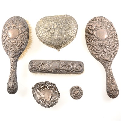 Lot 215 - Silver mounted dressing table accessories, to include a three piece dressing table set by James Deakin & Sons, Chester 1897, a small silver trinket dish, two glass pots with lids