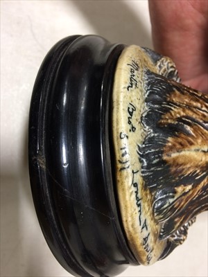 Lot 14 - A Martin Brothers stoneware Bird jar and cover, dated 1897