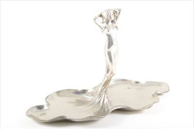 Lot 94 - An Art Nouveau silvered metal figural sweet dish, by WMF, circa 1905.