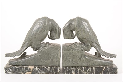 Lot 141 - A pair of Art Deco Parrot bookends by Georges van de Voorde, circa 1930