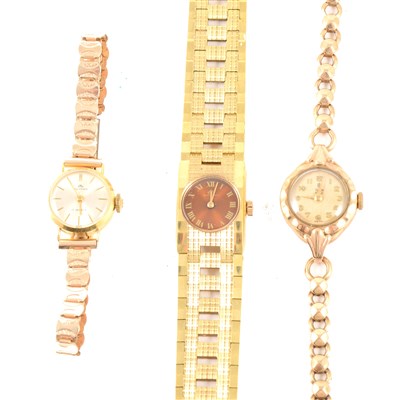 Lot 242 - Rolex Tudor Royal and Bucherer - a lady's 9 carat yellow gold Rolex Tudor Royal bracelet watch, round champagne colour dial with arabic numerals, fitted with a 9 carat yellow gold bracelet