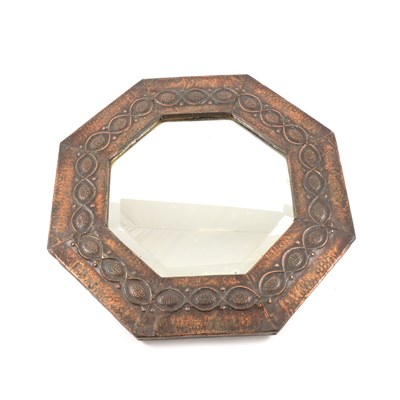 Lot 293 - An Arts & Crafts style oxidised copper framed wall mirror