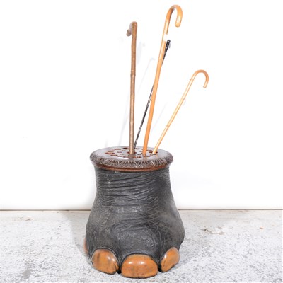 Lot 228 - Elephant's foot stick stand, oak mounted, with four walking sticks