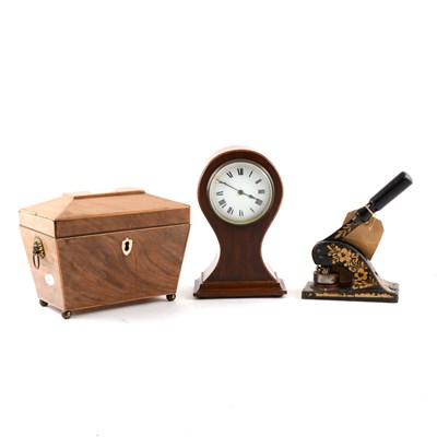 Lot 117 - An Edwardian mahogany balloon-shape mantel clock, ...