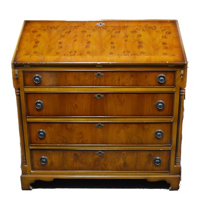Lot 306 - A reproduction yew wood finish bureau