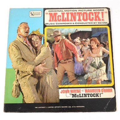 Lot 57 - John Wayne interest; a LP vinyl record bearing John Wayne signature on the cover