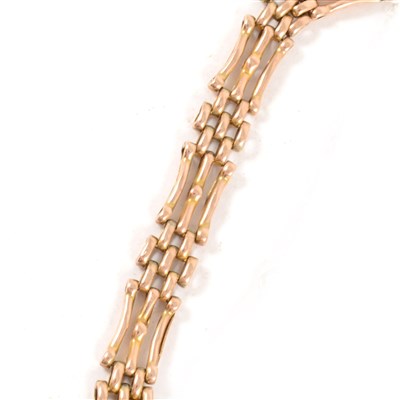 Lot 230 - A yellow metal three bar gate link bracelet
