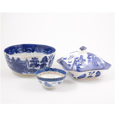 Lot 48 - A matched part dinner service of Willow pattern table ware