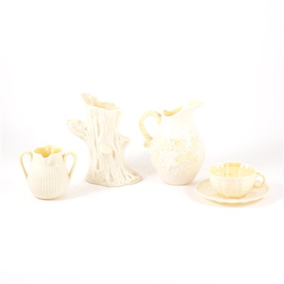 Lot 17 - A Belleek iridescent china tree stump vase, 18cm; ...