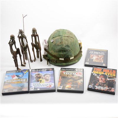 Lot 229 - A replica US Army helmet, after the film Full Metal Jacket, and other items.