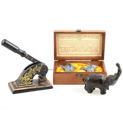 Lot 70 - Pair of reproduction bronze Chueh cups, patinated bronze elephant, cast iron table press, etc