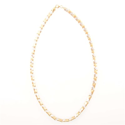 Lot 243 - A yellow and white metal necklace marked 750.