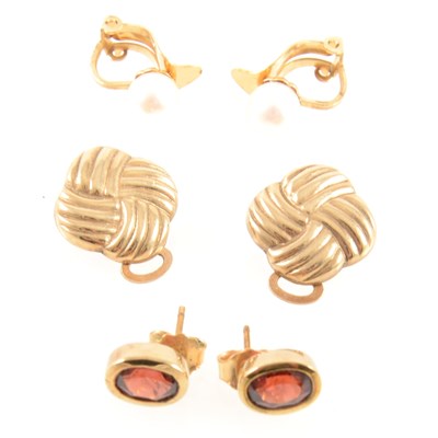 Lot 304 - A pair of garnet stud earrings, cultured pearl earrings and knot design clips.