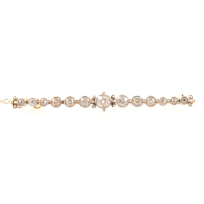 Lot 168 - A diamond set bar brooch.