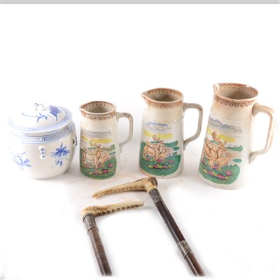 Lot 123 - Three ironstone graduating jugs,...