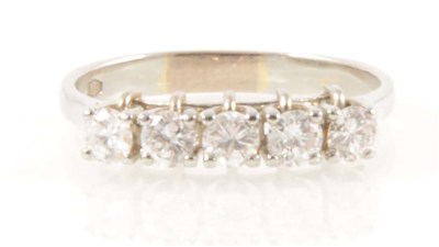 Lot 249 - A diamond five stone ring.