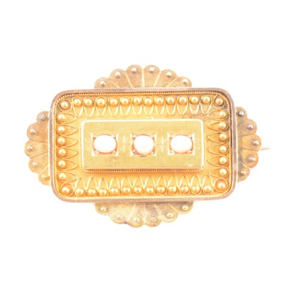 Lot 162 - An Etruscan style coral and pearl brooch.