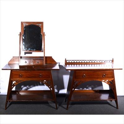 Lot 26 - A three-piece 'Anglo-Moresque' walnut bedroom suite, by Liberty & Co., circa 1880.