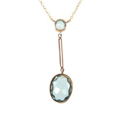 Lot 306 - A blue stone pendant.