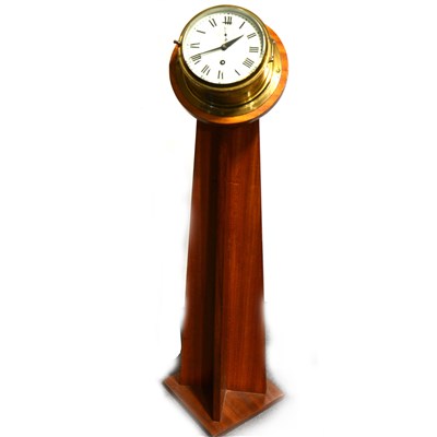Lot 394 - A brass cased ship's clock, ...