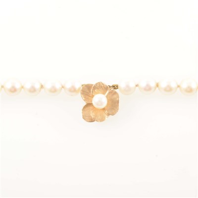 Lot 231 - A two row cultured pearl necklace with pearl clasp.