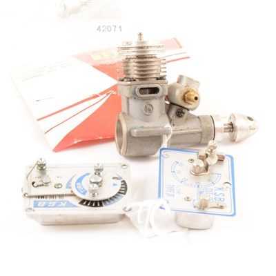 Lot 62 - AP .8cc glow with 3 spare heads and 2 KSB timers.