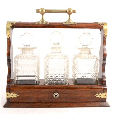 Lot 130 - Edwardian oak tantalus