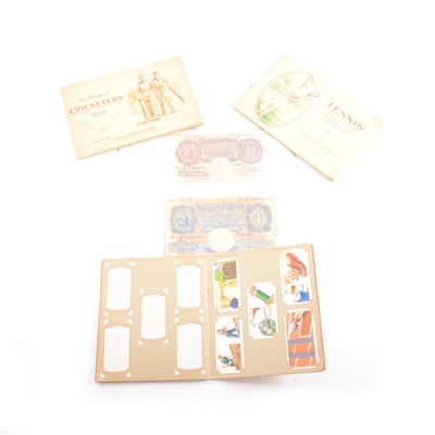 Lot 201 - Bank notes: Peppiatt, two Ten Shillings and two One Pound notes; and a collection of coins