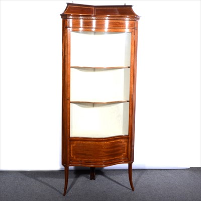 Lot 155 - An Edwardian inlaid mahogany free-standing corner cupboard, ...