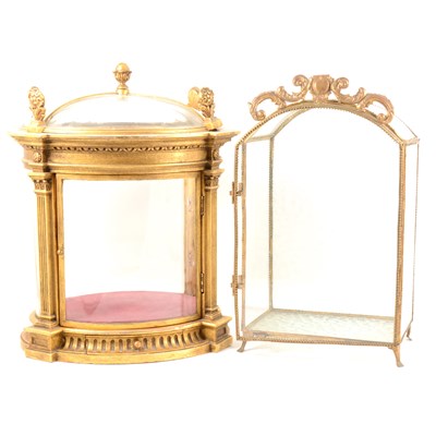 Lot 230 - A gilt table cabinet, of oval section, plaster strips, single drawer to the base, 42cm