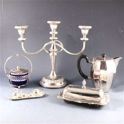 Lot 154 - An electroplated oval tray, plated candelabra, and other plated and stainless steel wares