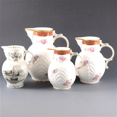 Lot 24 - Three Coalport bone china graduating jugs, ...