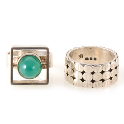 Lot 387 - Two modernist silver rings.