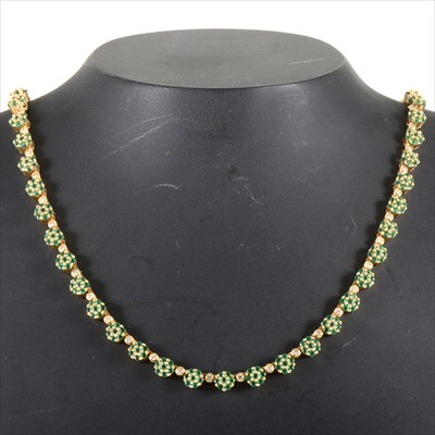 Lot 676 - An emerald and diamond necklace.
