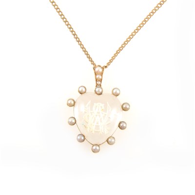 Lot 309 - A crystal heart shape pendant.