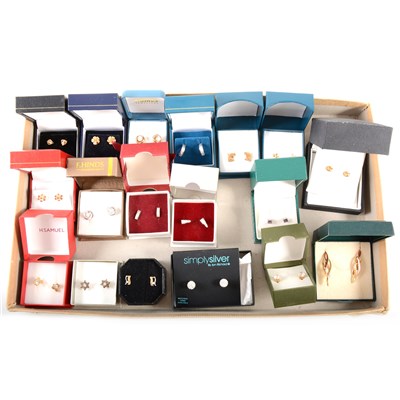 Lot 406 - Eighteen pairs of modern gold and silver earrings for pierced ears.