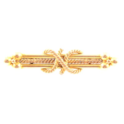 Lot 368 - A yellow metal bar brooch.