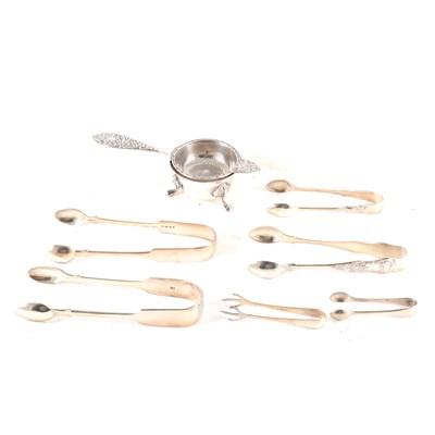 Lot 247 - Silver Jubilee silver tea strainer and stand, David Hollander & Son, Birmingham 1977, and silver sugar tongs